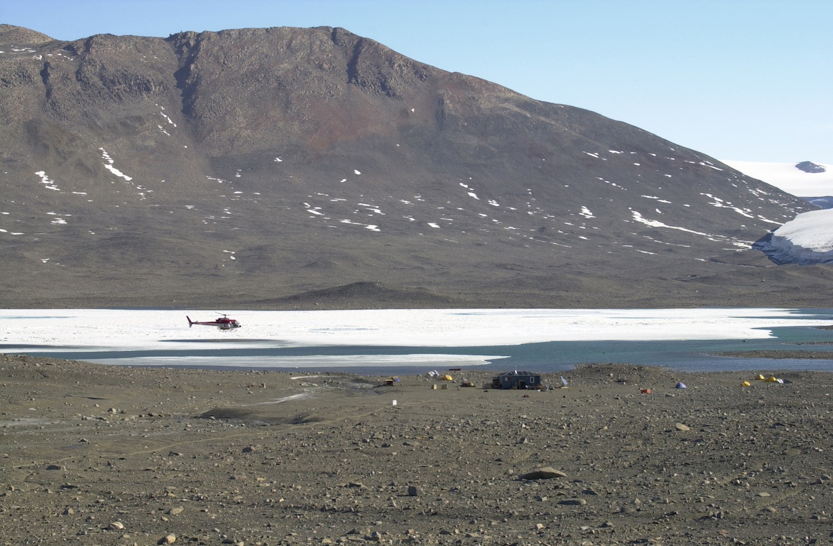 A helicopter lands at a field camp in the McMurdo Dry Valleys. (Photo by Emily Stone/National Science Foundation)