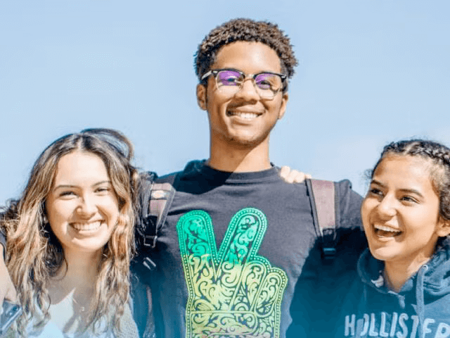 A Group of Smiling Students